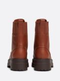 Brown TH Monogram Leather Cleat Boots  Women