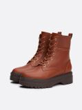 Brown TH Monogram Leather Cleat Boots  Women