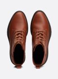 Brown TH Monogram Leather Cleat Boots  Women
