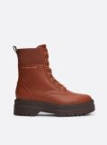 Brown TH Monogram Leather Cleat Boots  Women